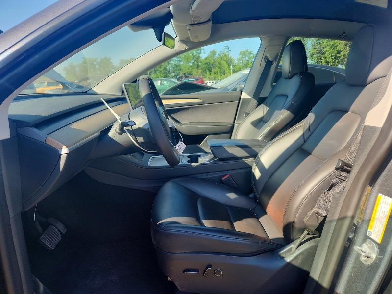 2023 Tesla Model y VIN 7SAYGDEE9PA034654 COPART salvage auction — SIDE, MD - CERT OF SALVAGE < 75% DAMAGE, sold $11,600 on 2026-07-07 (photo 7)