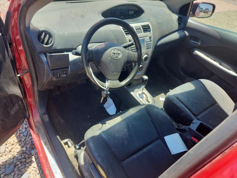 2011 Toyota Yaris VIN JTDBT4K30B1404802 COPART salvage auction — SIDE, Ks - Cert Of Title-Salvage, sold $750 on 2026-07-28 (photo 8)