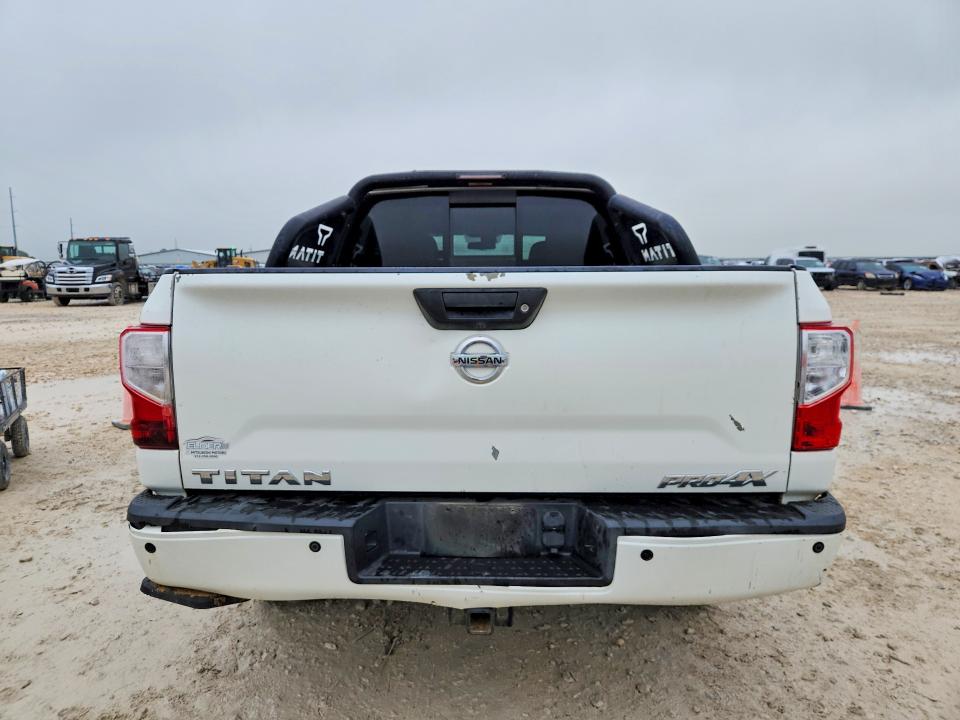 2018 Nissan VIN 1N6AA1E5XJN518825 COPART salvage auction — FRONT END, Tx - Salvage Vehicle Title, sold $4,350 on 2026-07-09 (photo 6)