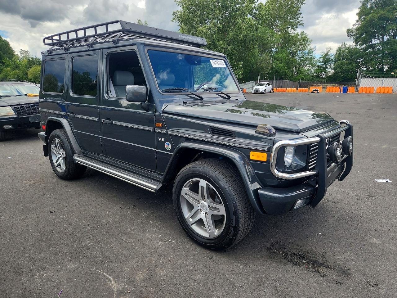 2002 Mercedes-benz G-klasse VIN WDCYR49EX2X128247 COPART salvage auction — Minor Dent/Scratches, OR - CT CLEAN TITLE PUBLIC ELIG., sold $21,700 on 2026-07-01 (photo 4)