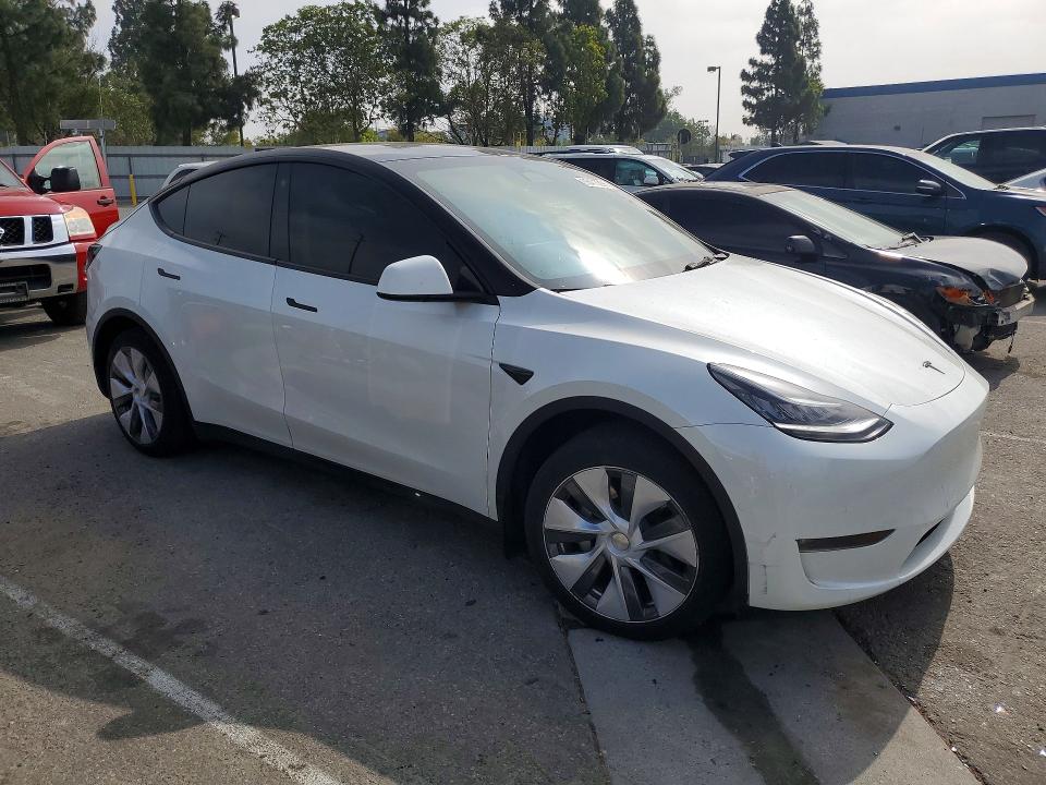 2022 Tesla Model y VIN 7SAYGDEE2NA022116 COPART salvage auction — REAR END, Ca - Salvage Certificate, sold $12,000 on 2026-07-30 (photo 4)