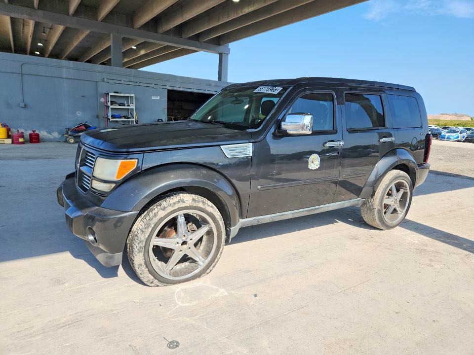 2011 Dodge VIN 1D4PU4GK4BW590627 COPART salvage auction — REAR END, FL - CERT OF TITLE SLVG REBUILDABLE, sold $350 on 2026-07-02 (photo 1)