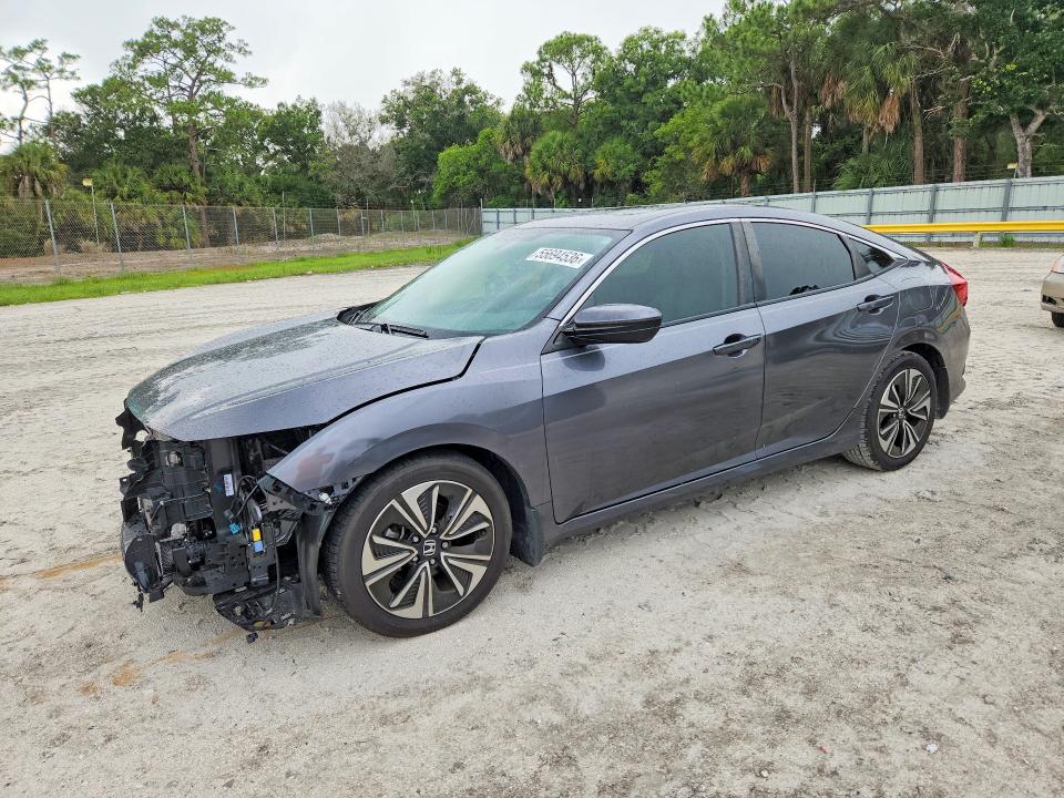 2018 Honda Civic VIN JHMFC1F3XJX032079 COPART salvage auction — FRONT END, Fl - Certificate Of Destruction, sold $3,550 on 2026-07-15 (photo 1)