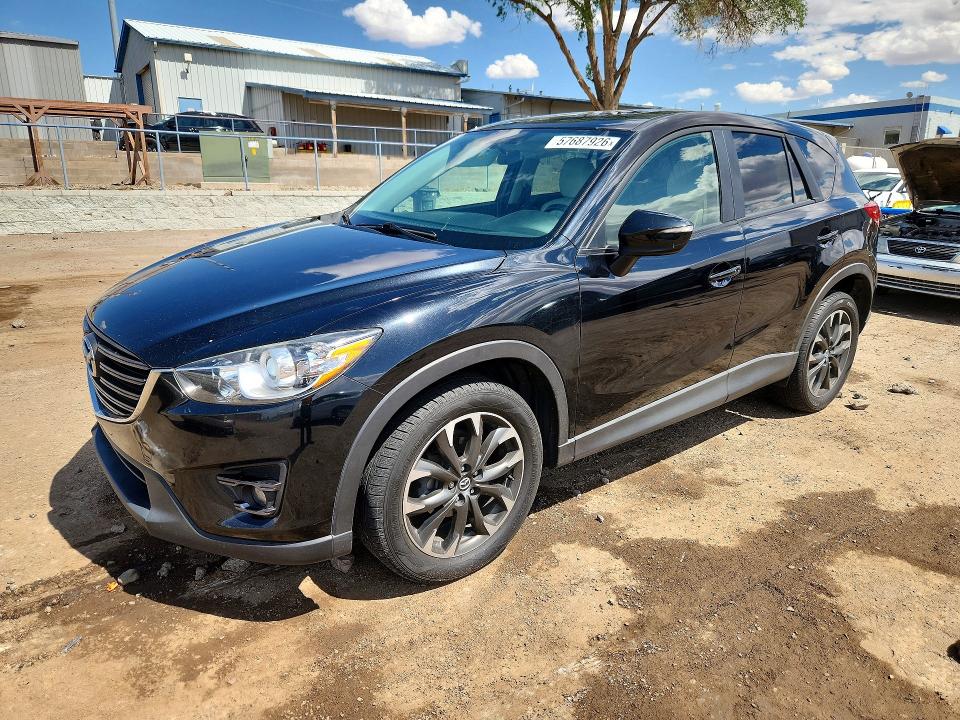 2016 Mazda VIN JM3KE4DY1G0748730 COPART salvage auction — VANDALISM, Nm - Cert Of Title-Salvage, sold $1,900 on 2026-07-30 (photo 1)