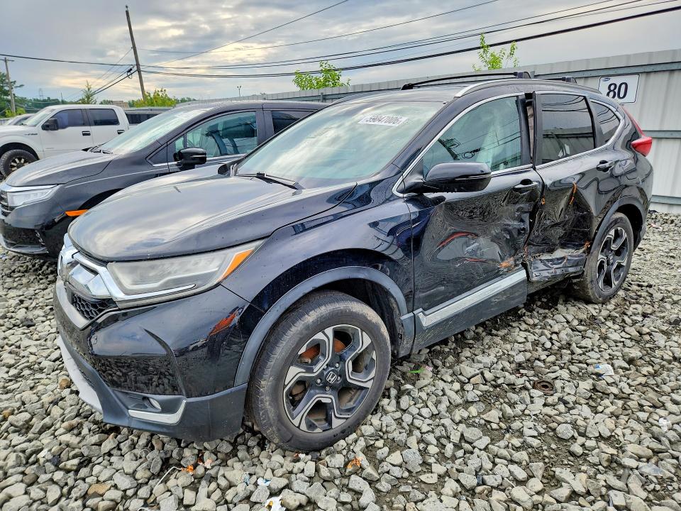 2017 Honda Cr-v VIN 2HKRW2H93HH632574 COPART salvage auction — SIDE, In - Certificate Of Title (P), sold $6,600 on 2026-07-06 (photo 1)