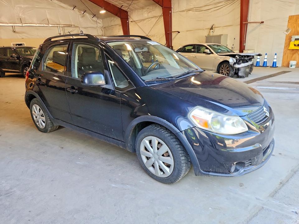 2011 Suzuki Sx4 VIN JS2YB5A38B6304170 COPART salvage auction — MINOR DENT/SCRATCHES, Vt - Certificate Of Title, sold $450 on 2026-07-06 (photo 4)