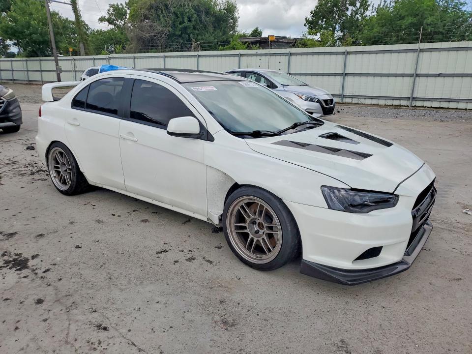 2014 Mitsubishi Lancer evolution VIN JA32W8FVXEU021204 COPART salvage auction — MECHANICAL, Tx - Certificate Of Title (P), sold $14,500 on 2026-07-28 (photo 4)