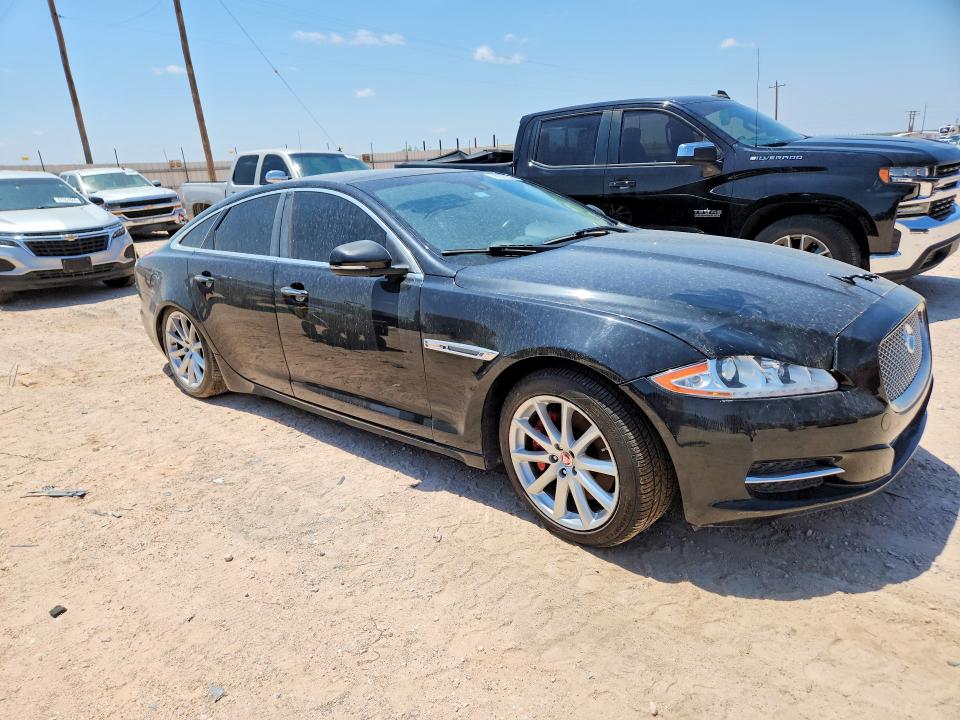 2015 Jaguar Xj VIN SAJWJ1CDXF8V79327 COPART salvage auction — MINOR DENT/SCRATCHES, Tx - Cert Of Title-Rebuilt Salvage (P), sold $2,750 on 2026-07-29 (photo 4)