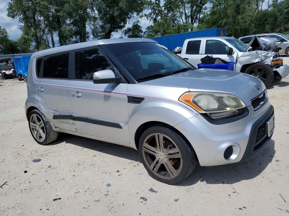 2012 Kia VIN KNDJT2A68C7417727 COPART salvage auction — SIDE, Fl - Cert Of Title Slvg Rebuildable, sold $250 on 2026-07-28 (photo 4)