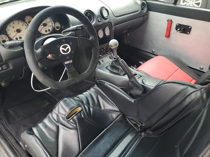 1999 Mazda Mx-5 VIN JM1NB3538X0100989 COPART salvage auction — WATER/FLOOD, Tx - Salvage Title-Flood Damage, sold $5,300 on 2026-07-23 (photo 8)