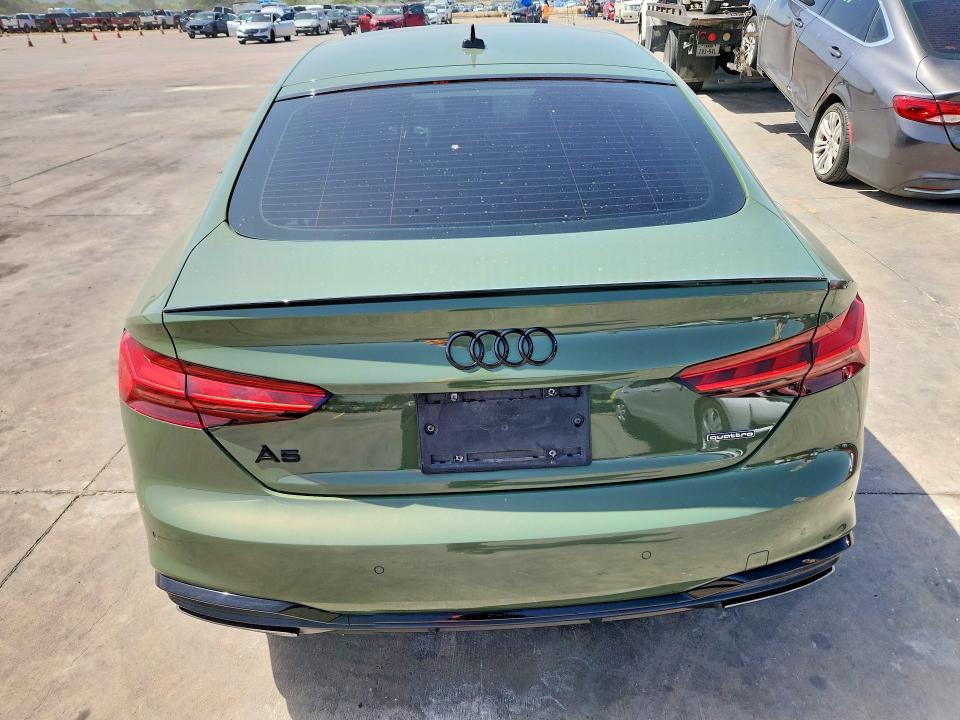 2023 Audi A5 VIN WAUFACF53PA030199 COPART salvage auction — WATER/FLOOD, TX - SALVAGE TITLE-FLOOD DAMAGE, sold $4,600 on 2026-07-30 (photo 6)