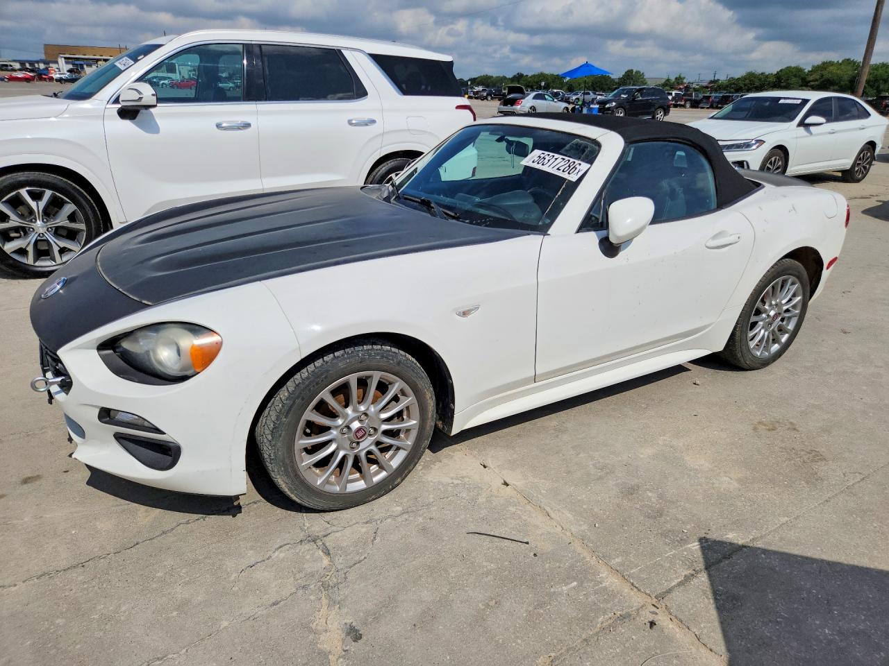 2018 Fiat 124 Spider VIN JC1NFAEK1J0137502 COPART salvage auction — Normal Wear, AR - CERTIFICATE OF TITLE (P), sold $4,350 on 2026-07-09 (photo 1)