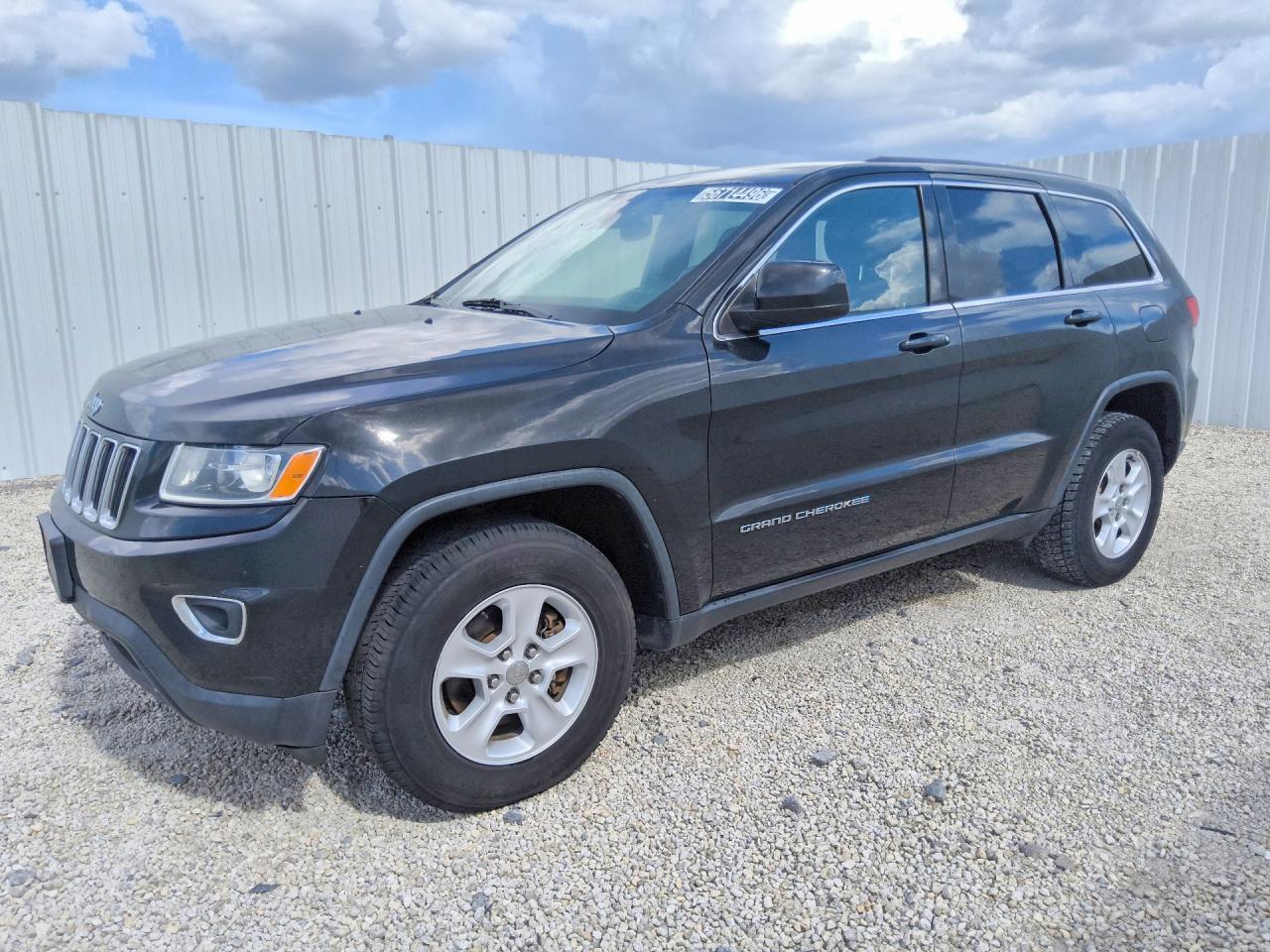 2015 Jeep Grand Cherokee VIN 1C4RJFAG4FC833391 COPART salvage auction — Normal Wear, FL - CERTIFICATE OF TITLE, sold $400 on 2026-07-09 (photo 1)