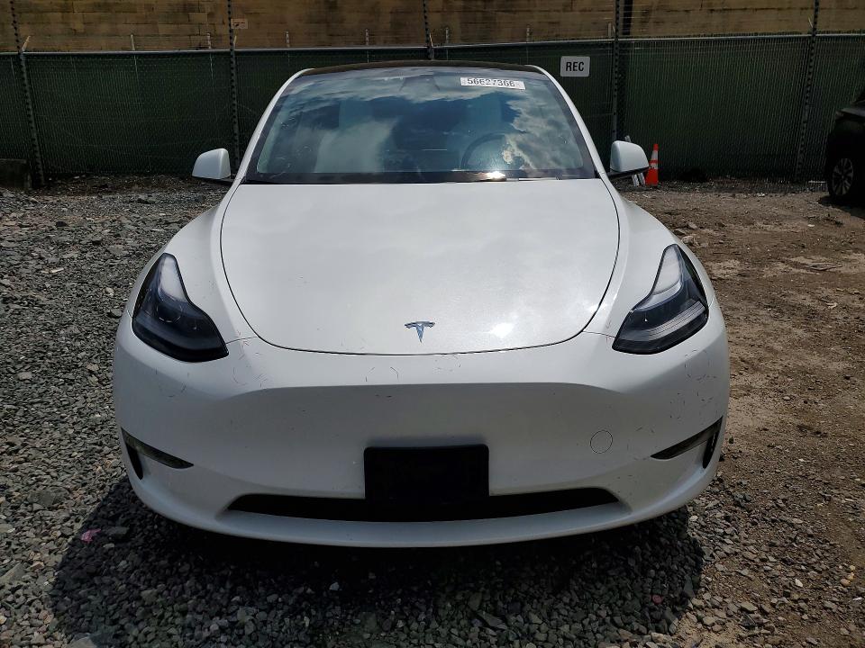 2023 Tesla Model y VIN 7SAYGDEF7PF788423 COPART salvage auction — REAR END, Salvage Title, sold $13,500 on 2026-07-23 (photo 5)