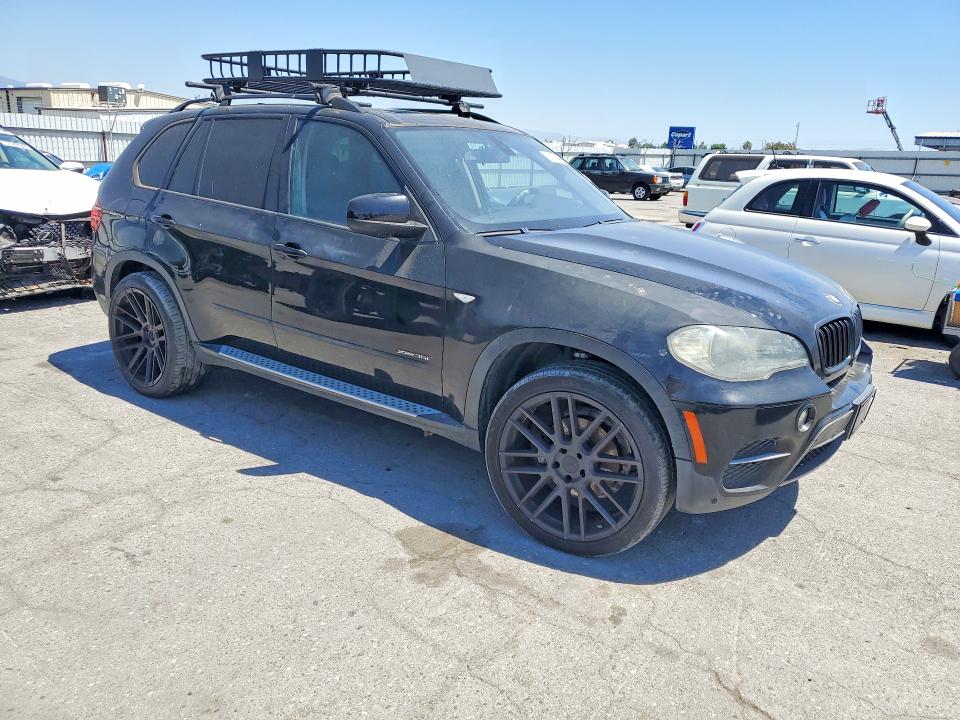 2011 BMW X5 VIN 5UXZV4C55BL403897 COPART salvage auction — MINOR DENT/SCRATCHES, Ca - Dis/Dlr/Exp Only Clean Title, sold $525 on 2026-07-31 (photo 4)
