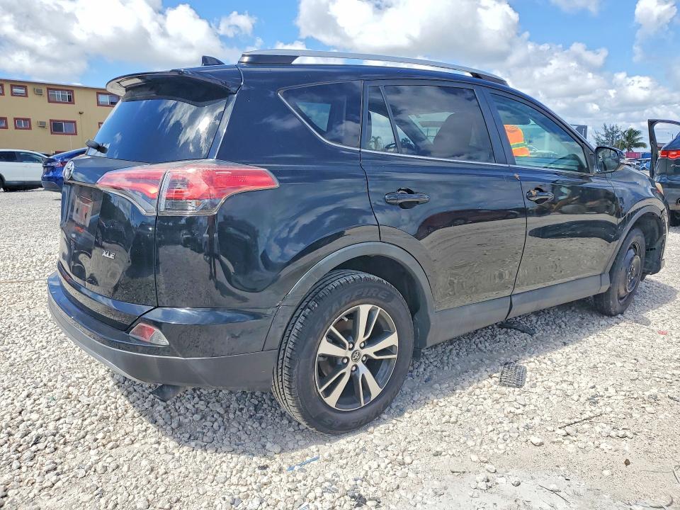 2017 Toyota Rav 4 VIN 2T3WFREV8HW369472 COPART salvage auction — SIDE, Fl - Cert Of Title Slvg Rebuildable, sold $6,400 on 2026-07-02 (photo 3)