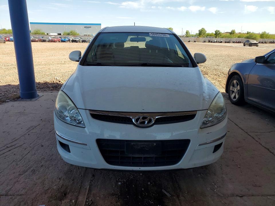2011 Hyundai Elantra VIN KMHDB8AE8BU086993 COPART salvage auction — NORMAL WEAR, Az - Cert Of Title - Salvage, sold $625 on 2026-07-07 (photo 5)
