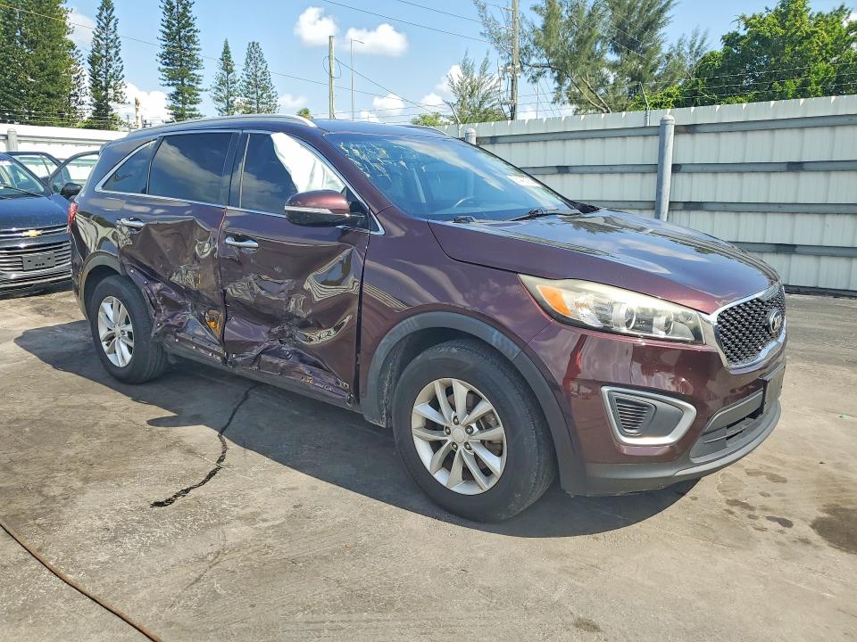 2016 Kia Sorento VIN 5XYPGDA32GG065818 COPART salvage auction — SIDE, Fl - Cert Of Title Slvg Rebuildable, sold $1,900 on 2026-07-13 (photo 4)