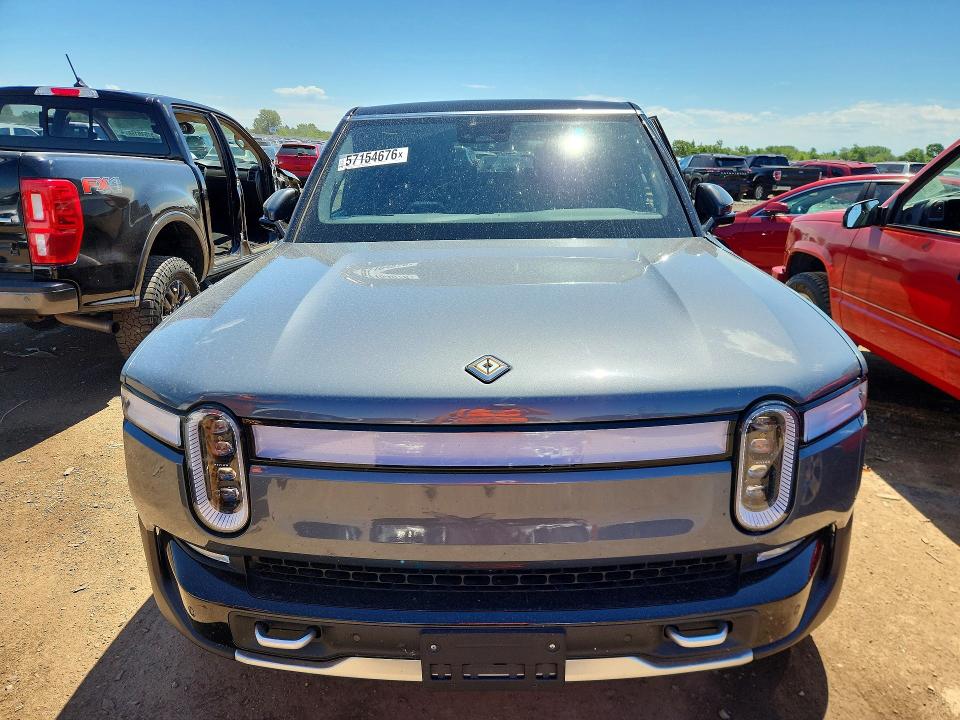 2023 Rivian VIN 7PDSGABA1PN023602 COPART salvage auction — FRONT END, Il - Salvage Certificate, sold $20,000 on 2026-07-13 (photo 5)