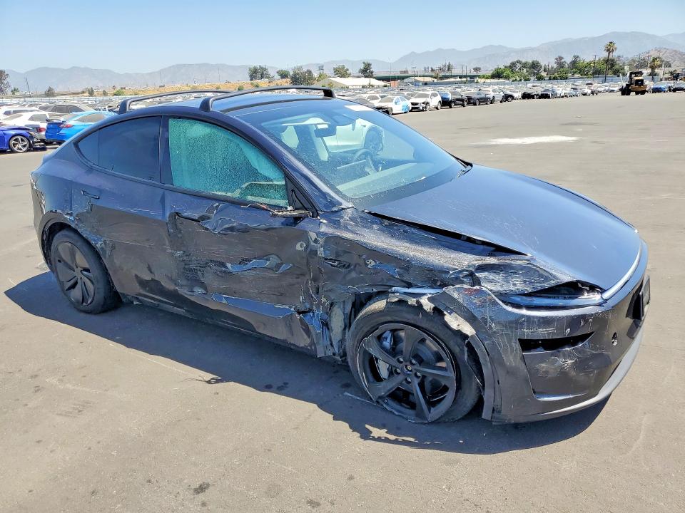 2026 Tesla Model y VIN 7SAYGDEE3TF345199 COPART salvage auction — SIDE, CA - SALVAGE CERTIFICATE, sold $15,800 on 2026-07-27 (photo 4)