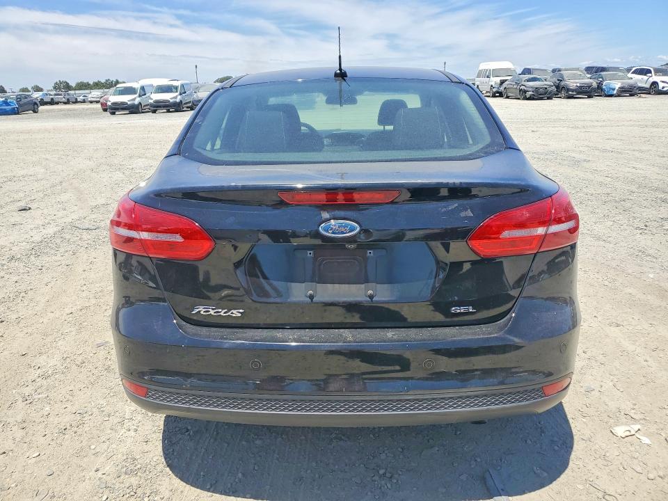 2018 Ford Focus VIN 1FADP3H29JL279023 COPART salvage auction — SIDE, Ca - Salvage Certificate, sold $1,300 on 2026-07-09 (photo 6)