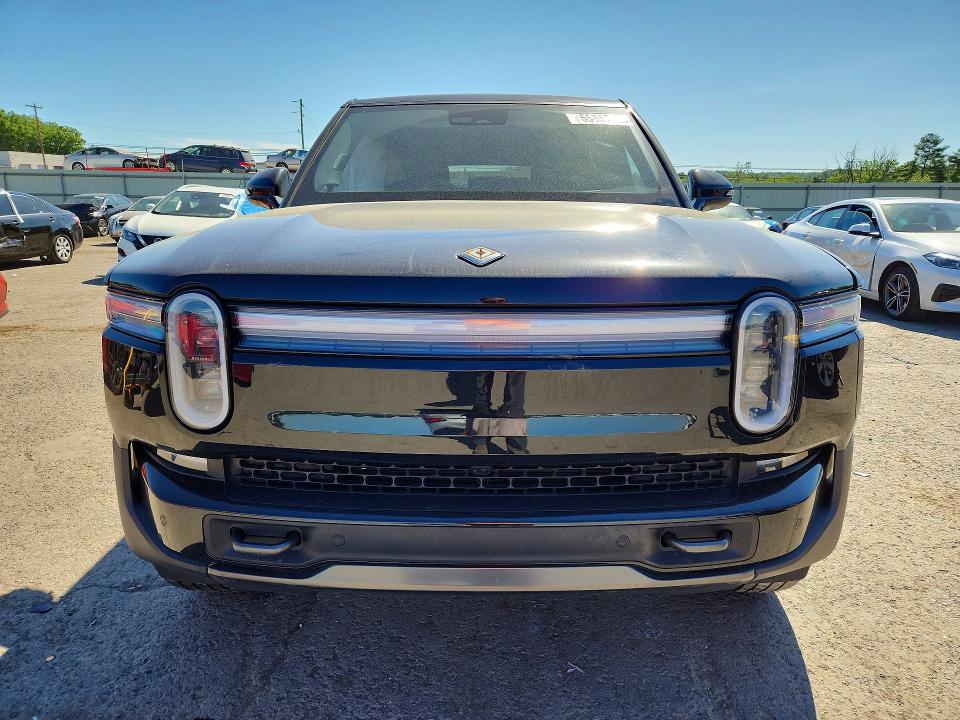 2025 Rivian VIN 7PDSGBBA6SN063849 COPART salvage auction — SIDE, Pa - Certificate Of Salvage, sold $19,100 on 2026-07-21 (photo 5)