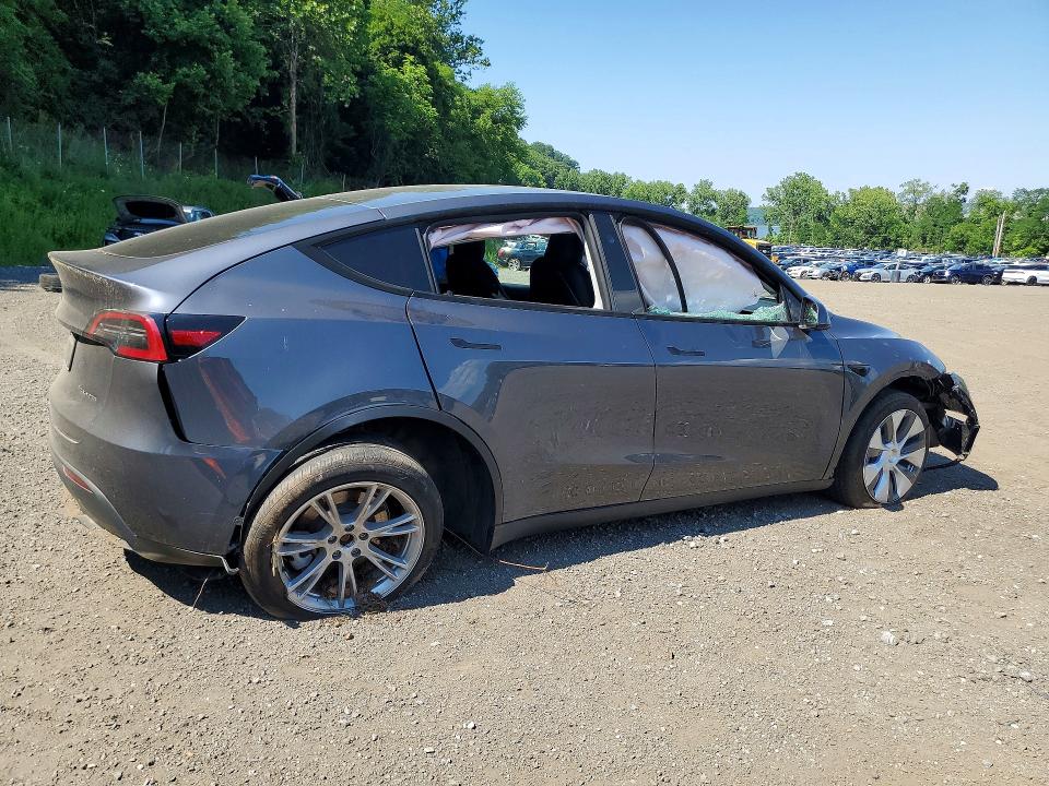 2023 Tesla Model y VIN 7SAYGAEE5PF932668 COPART salvage auction — FRONT END, NY - MV-907A SALVAGE CERTIFICATE, sold $9,300 on 2026-07-28 (photo 3)