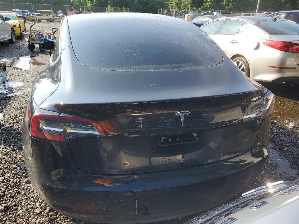 2018 Tesla Model 3 VIN 5YJ3E1EA8JF152035 COPART salvage auction — MINOR DENT/SCRATCHES, WV - CERTIFICATE OF TITLE, sold $8,600 on 2026-07-07 (photo 6)