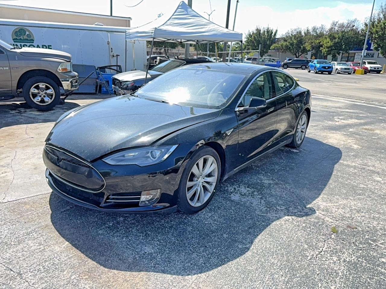 2014 Tesla Model S VIN 5YJSA1H1XEFP66125 COPART salvage auction — Normal Wear, FL - CERTIFICATE OF TITLE (P), sold $3,200 on 2026-07-01 (photo 2)