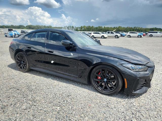 2023 BMW I4 VIN WBY33AW04PFN30530 COPART salvage auction — SIDE, Fl - Cert Of Title Slvg Rebuildable, sold $22,200 on 2026-08-04 (photo 4)