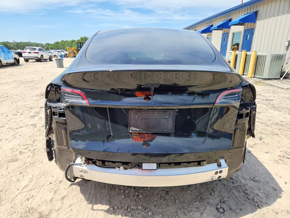 2024 Tesla Model y VIN 7SAYGDEE1RA215900 COPART salvage auction — FRONT END, Fl - Cert Of Title Slvg Rebuildable, sold $11,400 on 2026-07-17 (photo 6)