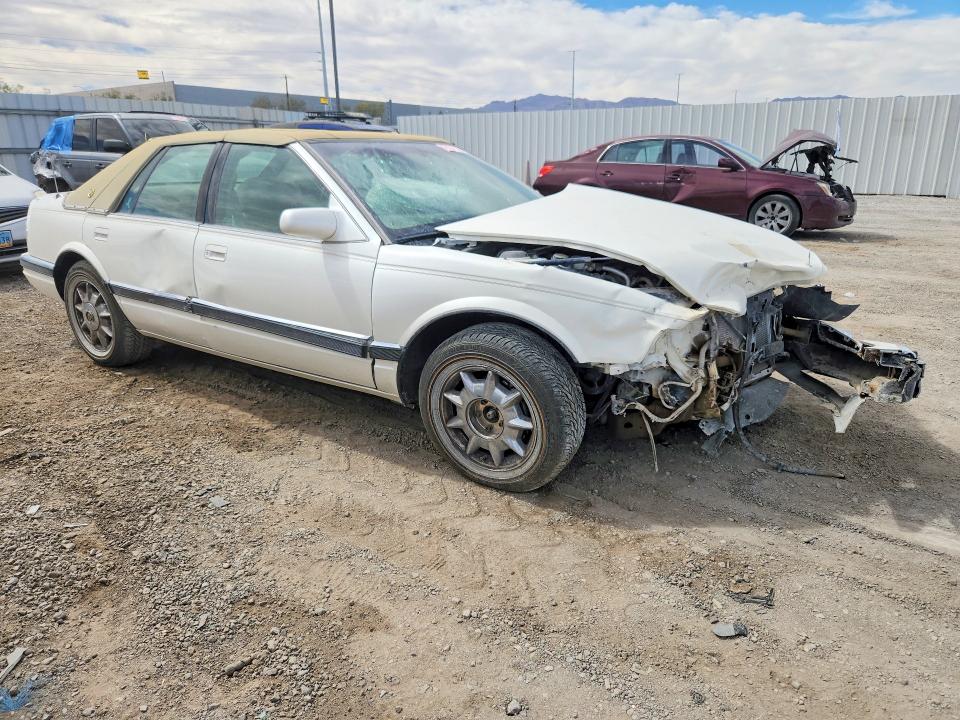 1996 Cadillac Seville VIN 1G6KS52Y9TU810987 COPART salvage auction — FRONT END, NV - NON-REPAIRABLE VEHICLE CERT, sold $125 on 2026-07-02 (photo 4)