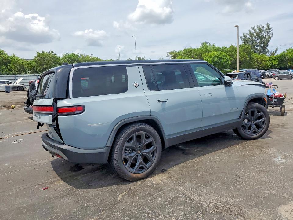2025 Rivian R1s VIN 7PDSGBBA9SN054322 COPART salvage auction — SIDE, Ks - Cert Of Title-Salvage, sold $10,400 on 2026-07-20 (photo 3)