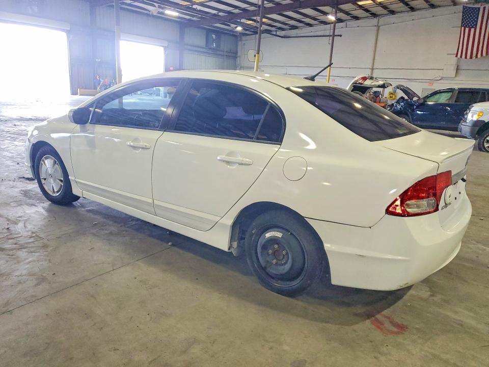 2010 Honda Civic hybrid VIN JHMFA3F22AS007411 COPART salvage auction — MECHANICAL, Fl - Cert Of Title Slvg Rebuildable, sold $400 on 2026-07-13 (photo 2)
