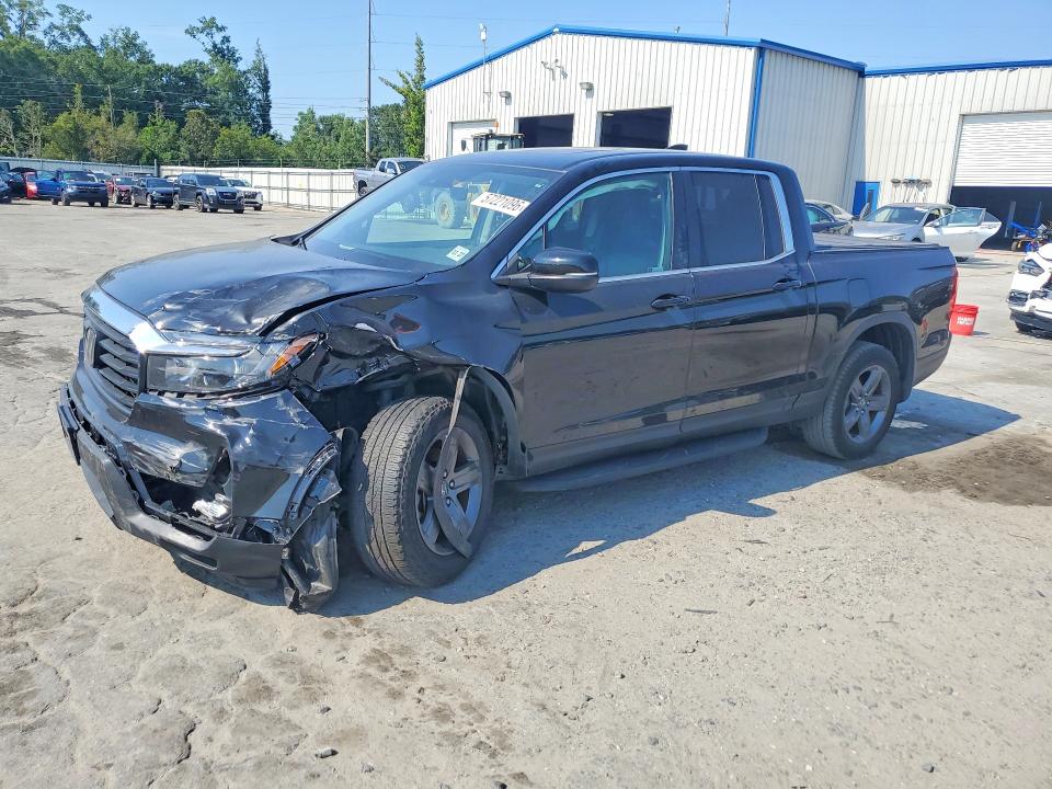 2023 Honda Ridgeline VIN 5FPYK3F59PB004472 — COPART salvage auction photo