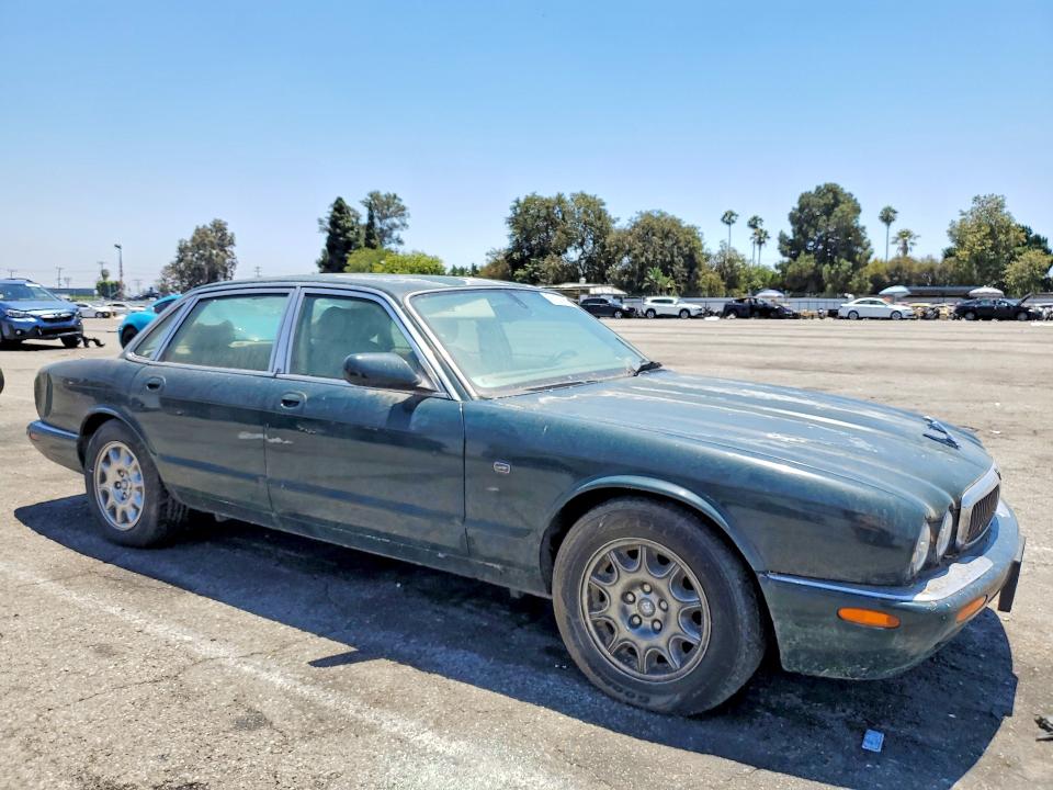 2003 Jaguar Xj series VIN SAJDA14C53LF55302 COPART salvage auction — MINOR DENT/SCRATCHES, CA - DIS/DLR/EXP APP FOR DUP CLEAN, sold $300 on 2026-09-18 (photo 4)