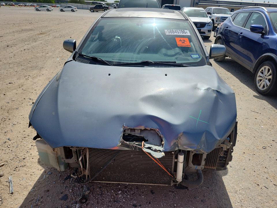 2014 Mitsubishi Lancer VIN JA32U8FW0EU002286 COPART salvage auction — FRONT END, Tx - Salvage Vehicle Title, sold $600 on 2026-07-09 (photo 5)