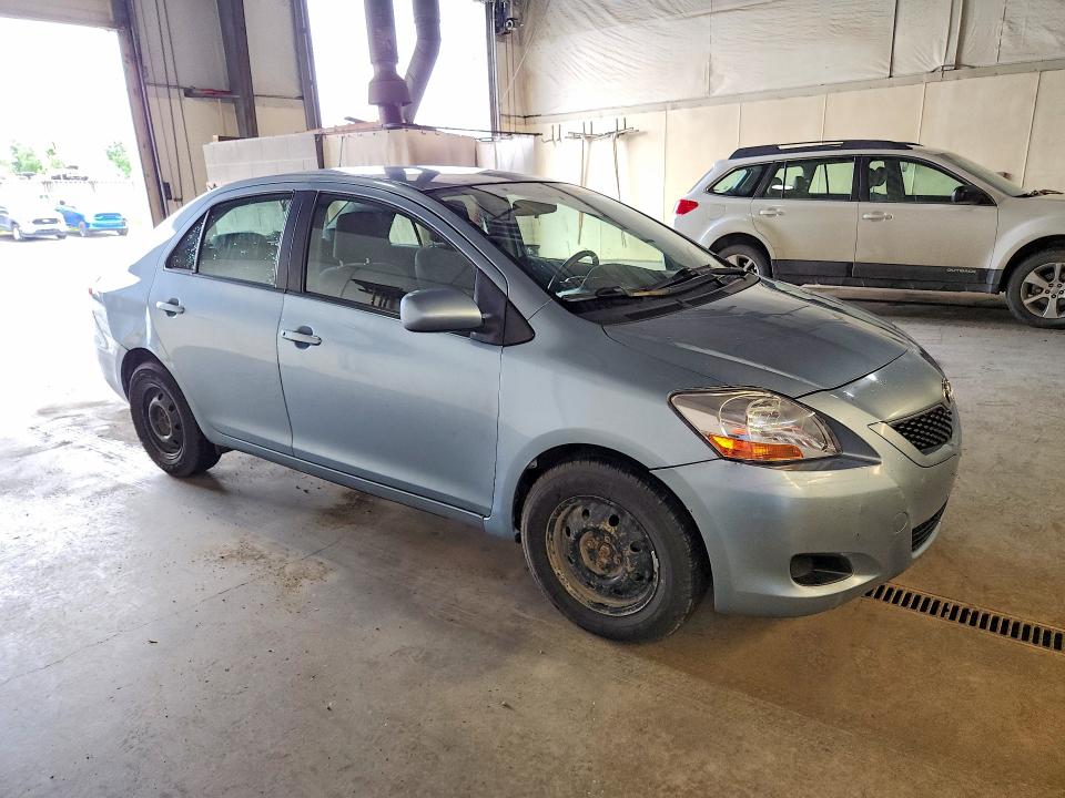 2010 Toyota Yaris VIN JTDBT4K32A4073038 COPART salvage auction — MINOR DENT/SCRATCHES, Ak - Cert Of Veh Title-Reconstructe, sold $1,150 on 2026-07-07 (photo 4)