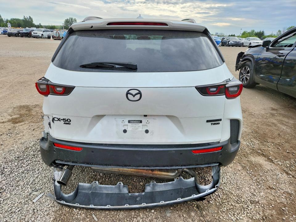 2023 Mazda Cx-50 VIN 7MMVABDY4PN104809 COPART salvage auction — ALL OVER, ON - PERMIT SALVAGE, sold $200 on 2026-07-30 (photo 6)