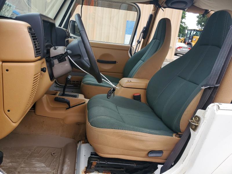 1997 Jeep Wrangler / VIN 1J4FY49S7VP520381 COPART salvage auction — MINOR DENT/SCRATCHES, Oh - Certificate Of Title, sold $2,400 on 2026-07-08 (photo 7)