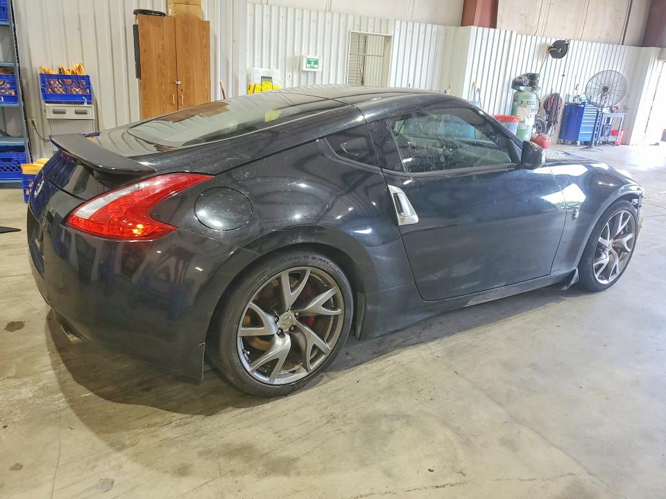 2015 Nissan VIN JN1AZ4EH3FM443067 COPART salvage auction — FRONT END, Tx - Salvage Vehicle Title, sold $3,200 on 2026-07-20 (photo 3)