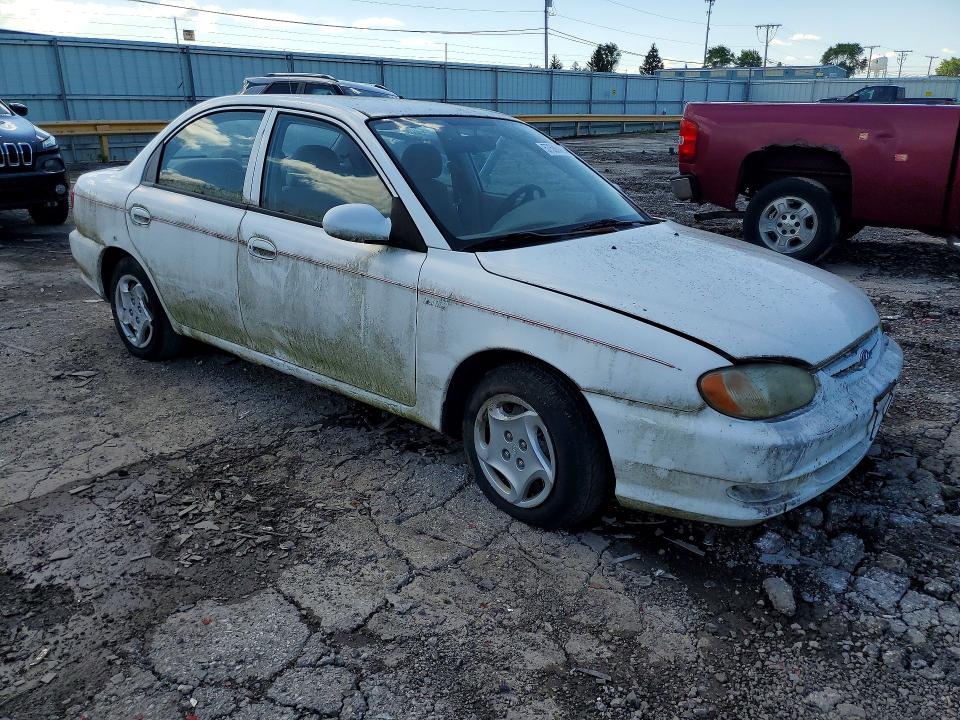 2001 Kia Sephia VIN KNAFB121615011750 COPART salvage auction — MECHANICAL, In - Certificate Of Title, sold $325 on 2026-07-13 (photo 4)