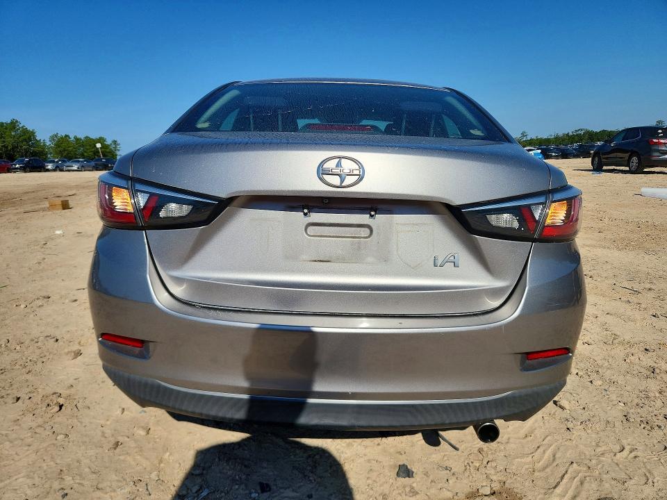 2016 Scion Ia VIN 3MYDLBZV0GY106307 COPART salvage auction — SIDE, Fl - Cert Of Title Slvg Rebuildable, sold $1,550 on 2026-07-10 (photo 6)