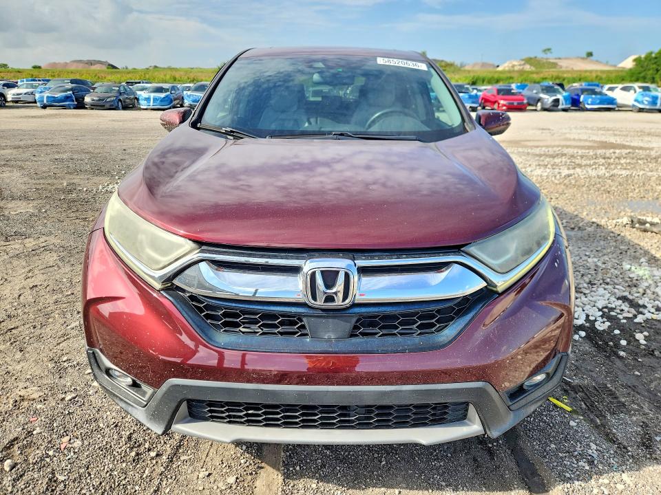 2018 Honda Cr-v VIN 7FARW1H80JE053181 COPART salvage auction — SIDE, FL - CERT OF TITLE SLVG REBUILDABLE, sold $7,800 on 2026-07-07 (photo 5)