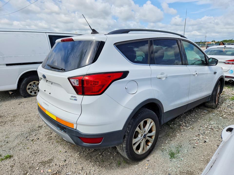 2019 Ford Escape VIN 1FMCU9HD0KUB14827 COPART salvage auction — MINOR DENT/SCRATCHES, Fl - Certificate Of Title, sold $2,050 on 2026-07-09 (photo 3)