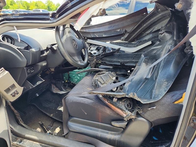 2009 Toyota Yaris VIN JTDJT903295233856 COPART salvage auction — ALL OVER, IN - CERT OF TITLE-SALVAGE TITLE (P), sold $225 on 2026-07-27 (photo 7)