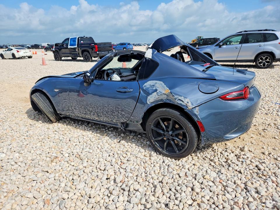 2021 Mazda Mx-5 miata VIN JM1NDAM72M0457924 COPART salvage auction — ALL OVER, Tx - Salvage Vehicle Title, sold $70 on 2026-07-30 (photo 2)