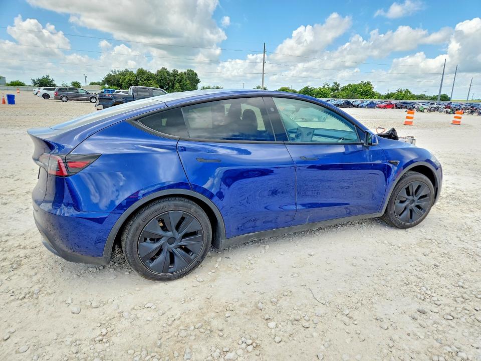 2024 Tesla Model y VIN 7SAYGAEEXRF115490 COPART salvage auction — SIDE, TX - SALVAGE VEHICLE TITLE (P), sold $13,700 on 2026-07-16 (photo 3)