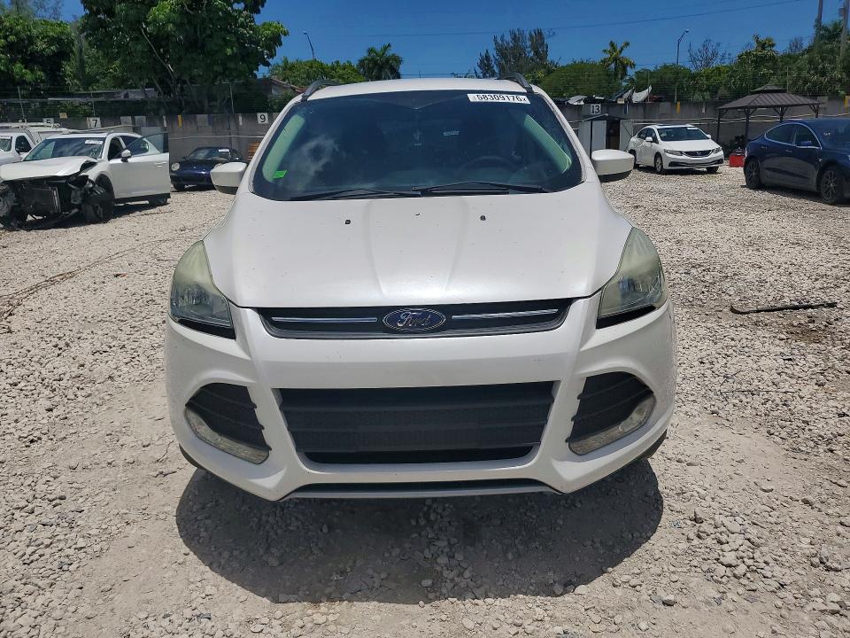 2016 Ford Escape VIN 1FMCU0GX6GUC19905 COPART salvage auction — SIDE, Fl - Cert Of Title Slvg Rebuildable, sold $1,650 on 2026-07-02 (photo 5)