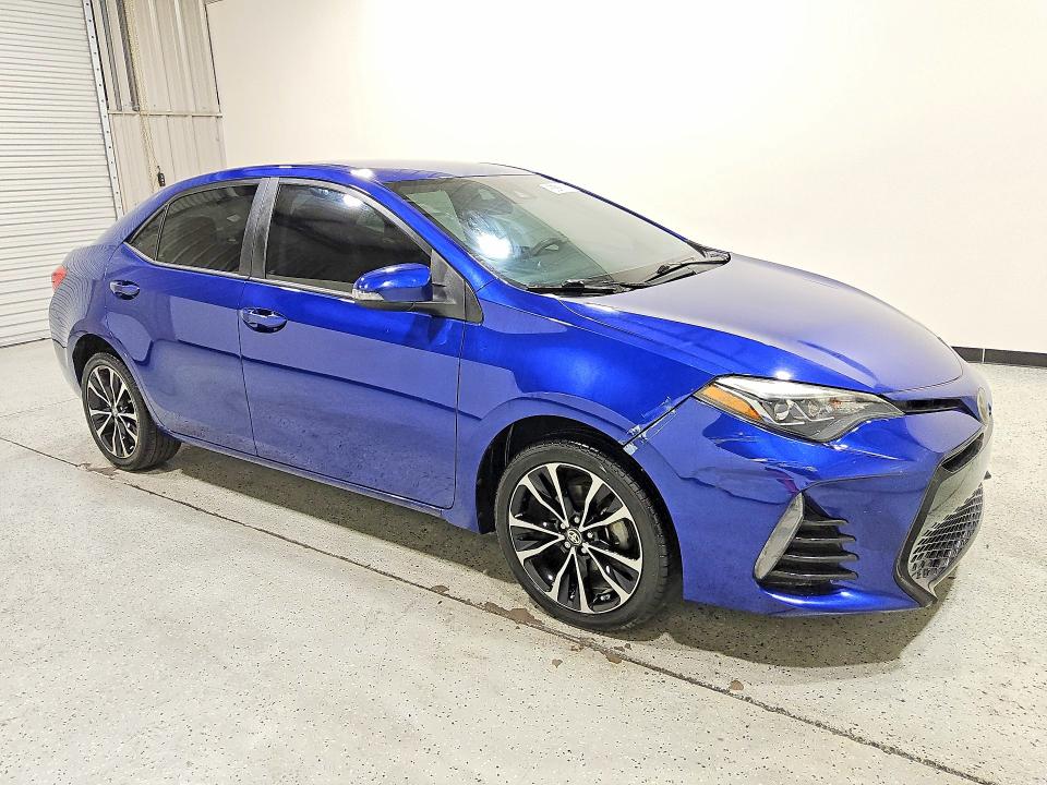2019 Toyota Corolla VIN 5YFBURHE5KP907983 COPART salvage auction — NORMAL WEAR, Fl - Certificate Of Title, sold $7,400 on 2026-07-28 (photo 4)